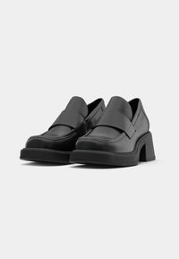Black leather loafers with a wide strap across the front, square toe, and block heel; smooth texture with a matte finish.