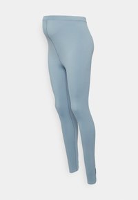 Leggings de cor azul clara feitos de um tecido elástico. Apresentam uma cintura sem costura e punhos de tornozelo estreitos, proporcionando um visual suave e ajustado.