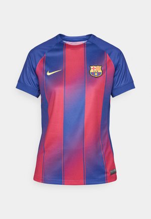 Red and blue short-sleeve jersey with horizontal stripes, featuring a round neckline and a crest logo on the left chest. Nike swoosh in gold.