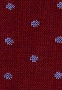 Maroon fabric with a textured knit pattern featuring evenly spaced small light purple embroidered designs.