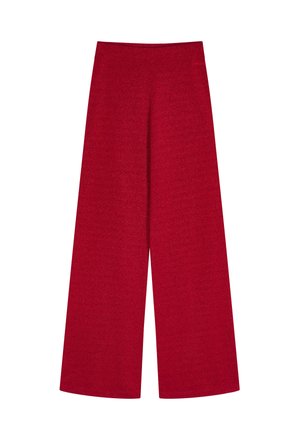 Pantalones rojos de pierna ancha con cintura alta, elaborados con tela texturizada. Cuentan con una cintura lisa y aberturas acampanadas en las piernas.