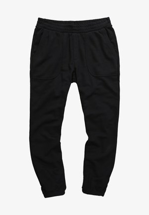 Schwarze Jogginghose aus weichem Stoff mit elastischem Taillenbund, zwei seitlichen Taschen und schmal zulaufenden Knöcheln.
