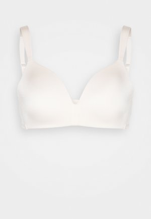 Witte, naadloze beha met een driehoekige vorm, verstelbare banden en een gladde textuur. Geschikt voor dagelijks gebruik.