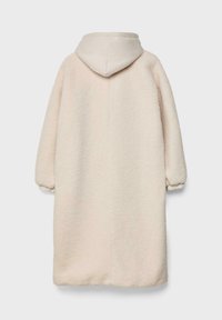 Lang, hættet frakke i blød, tekstureret cremefarvet stof med elastiske manchetter. Glat hætte og minimale syninger.