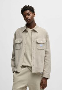 Unselected, open white one