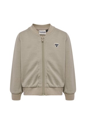 Beige børnejakke med lynlås, ribstrikkede manchetter og linning, med et lille bi-logo på venstre bryst.