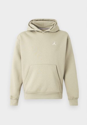 Hætte sweatshirt i lys beige bomuldsblanding med en frontlomme og et hvidt Jordan-logo på brystet. Blød tekstur, standard pasform.