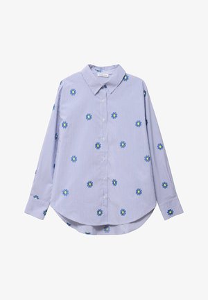 Long-sleeve, button-up shirt with vertical light blue stripes and scattered small blue and yellow floral patterns.