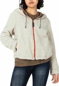 Off-white fleece hoodie with a zip front, red zipper detail, and adjustable drawstrings. It features a relaxed fit and elastic cuffs.