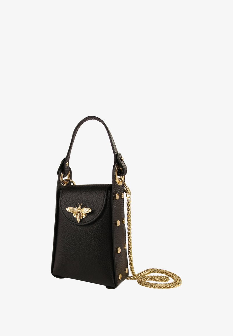 Black leather handbag with a structured shape, featuring a gold bee detail on the flap, gold studs, and a chain strap.