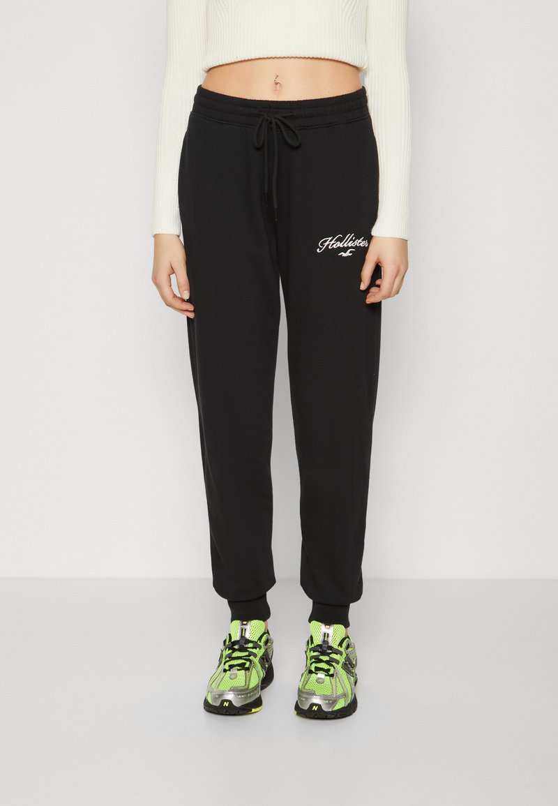 Hollister Co. LOGO GRAPHIC Tracksuit bottoms black Zalando.ie