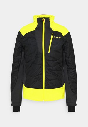 Chaqueta acolchada negra y amarillo neón con cuello alto, cremallera frontal, bolsillo en el pecho y logo de Vaude en el lado superior izquierdo.