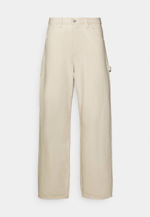 Beige, bő szárú nadrág, pamut keverék anyagból. Gombos záródással, övhurkokkal és oldalsó zsebekkel rendelkezik. Simább tapintású.