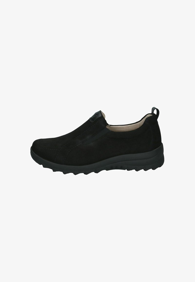 Chaussure casual noire à enfiler avec semelle texturée, talon bas et languette à l’arrière, conçue pour un port facile et un confort optimal.