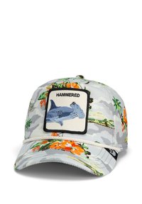 Cappello a fantasia floreale grigio con accenti arancioni e verdi. Presenta un'etichetta rettangolare con uno squalo martello blu e il testo "HAMMERED".