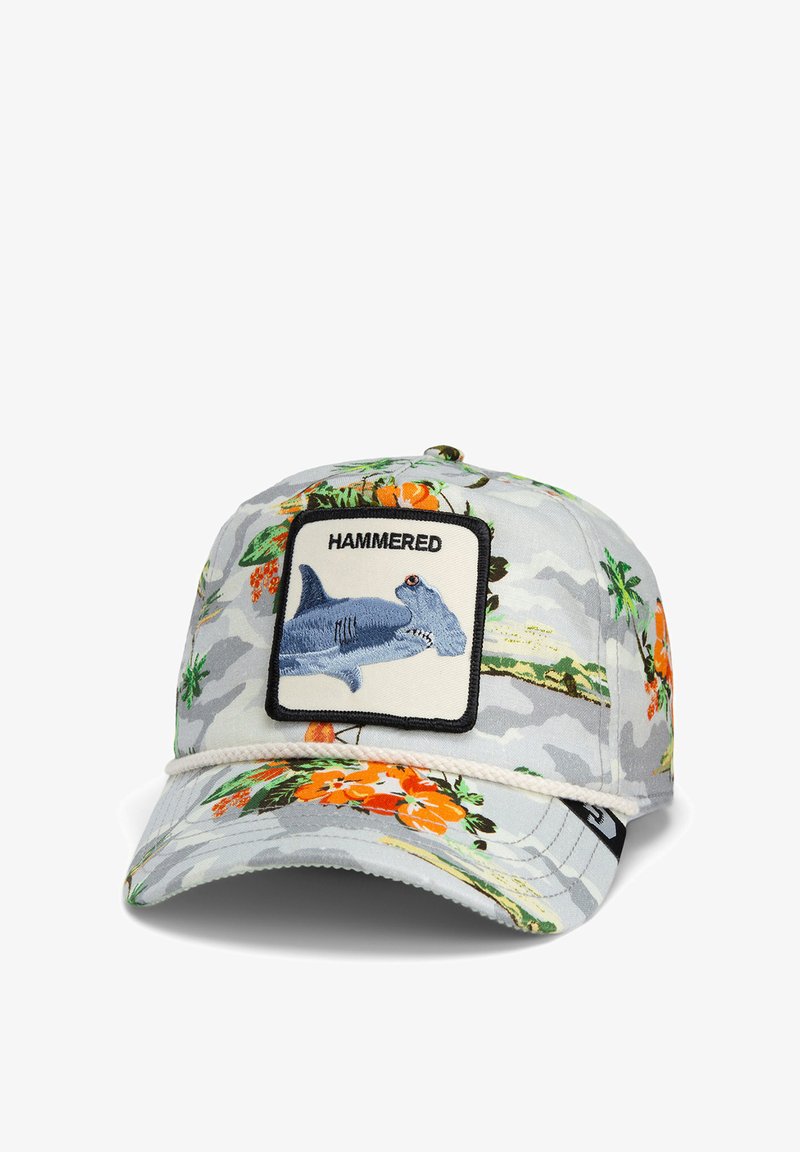 Czapka w szarym kolorze z kwiatowym wzorem i pomarańczowymi oraz zielonymi akcentami. Posiada prostokątną naszywkę z niebieskim młotowcem i napisem "HAMMERED".