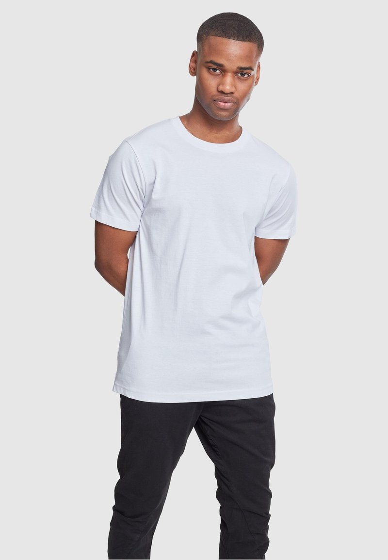 Witte katoenen T-shirt met korte mouwen en een klassieke ronde hals, met een gladde textuur en een relaxed fit.