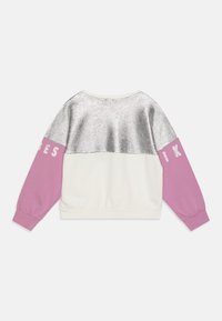 Sweatshirt with silver metallic upper section, white middle, and pink sleeves featuring white text, shown from the back on a white background.
