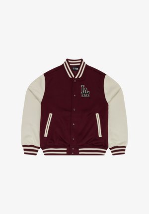 Bordo varšavska jakna s krem rukavima, rebrastim manžetama, bijelim prugama i "LA" logotipom na prsima. Zatvaranje na dugmiće. Meka tekstura.