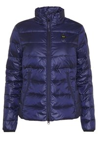 Doudoune bleu marine en matériau brillant, avec un col montant, une fermeture zippée et des poches latérales au design matelassé.