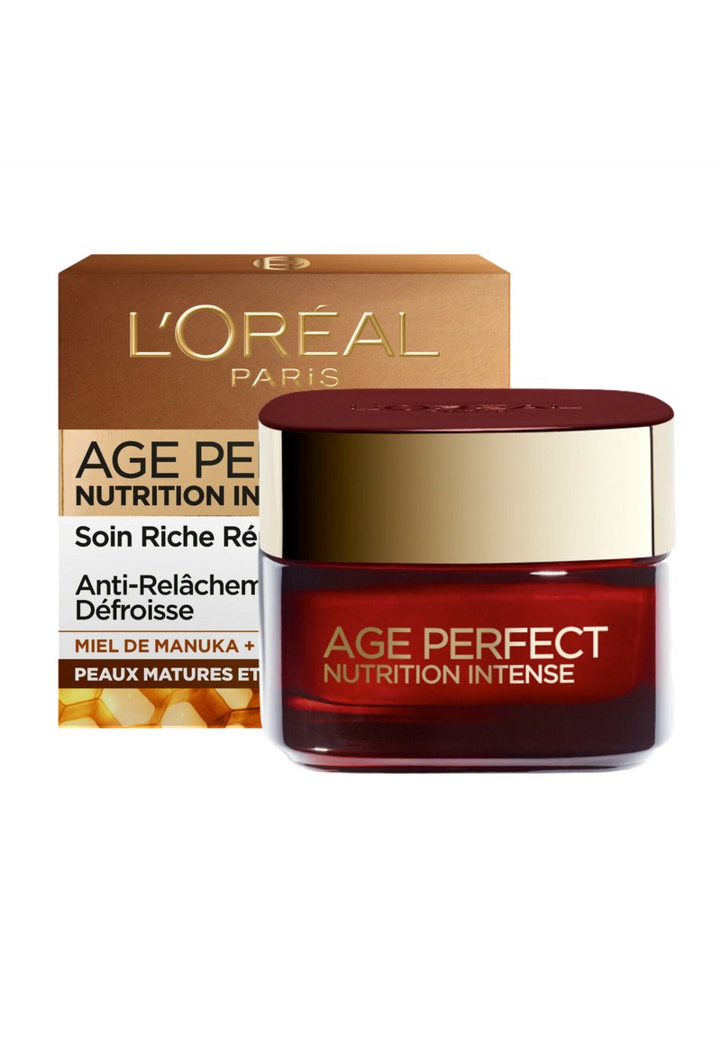 Crème Nutrition Intense Age Perfect de L'Oréal Paris dans un pot rond rouge profond avec un couvercle doré, accompagnée d'une boîte dorée et blanche avec les détails du produit.