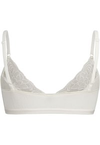 Witte bralette met kantdetail bij de halslijn, verstelbare bandjes, zachte stof en een naadloos ontwerp. Functionele en comfortabele pasvorm.