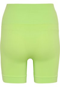 Höga, neongröna cykelshorts i stretchigt tyg. Har en mjuk textur och rena linjer, med en åtsittande silhuett.