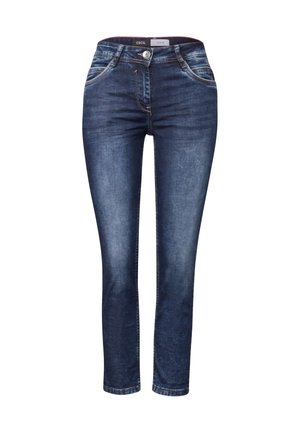 Jean en denim bleu foncé avec une coupe slim, cinq poches, des détails de décoloration, et une fermeture à bouton à la taille. Texture lisse et finition légèrement décolorée.