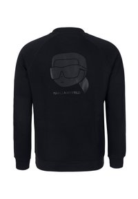 Sudadera negra con un gráfico mate de una figura con gafas en la parte trasera. Tejido suave, cuello redondo y puños acanalados.