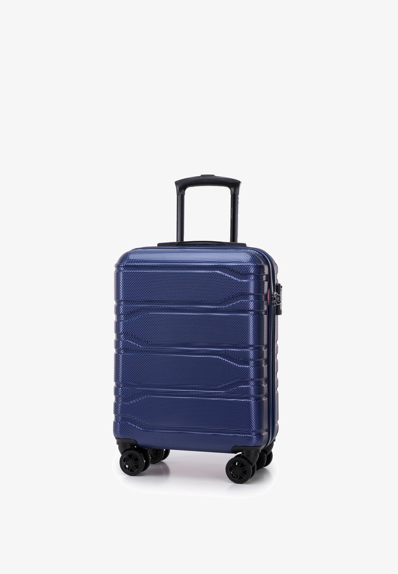 Valigia rigida blu con superficie testurizzata, 4 ruote e manico estensibile. Presenta una chiusura zip e un design compatto rettangolare.