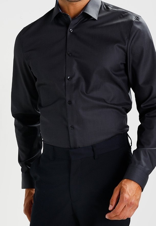 Dark gray long-sleeve shirt made of smooth fabric, featuring a pointed collar, button-down front, and subtle sheen with contrasting collar.