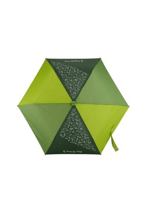 Green umbrella featuring a two-tone design with dark and light green panels. Decorative white graphics and text "Step by Step" are visible.