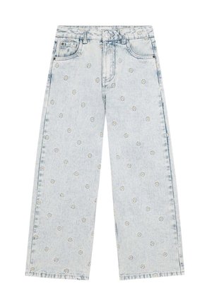 Vaqueros de mezclilla azul claro con un ajuste holgado, que presentan un patrón floral de pequeñas margaritas amarillas y blancas. Diseño clásico de cinco bolsillos.