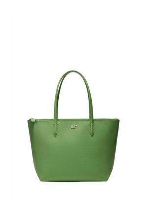 Sac cabas en cuir vert avec double poignée et petit logo crocodile au centre avant, doté d'une fermeture éclair supérieure.