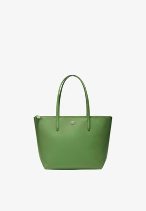 Sac cabas en cuir vert avec double poignée et petit logo crocodile au centre avant, doté d'une fermeture éclair supérieure.