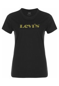 Tricou din bumbac negru, cu guler rotund și mâneci scurte. Logo-ul Levi's, de culoare aurie, afișat proeminent pe piept.