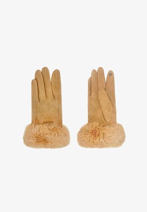 Guanti in camoscio beige con polsino in pelliccia morbida, dettagli cuciti sul retro e una texture liscia. Il guanto sinistro presenta un accento decorativo.