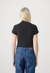 ONLY ONLLIVE LOVE ZIP TOP - Camiseta básica - black