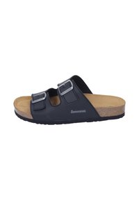 Black slip-on sandal with two adjustable buckled straps, tan cushioned cork footbed, and textured black sole, viewed from the side.