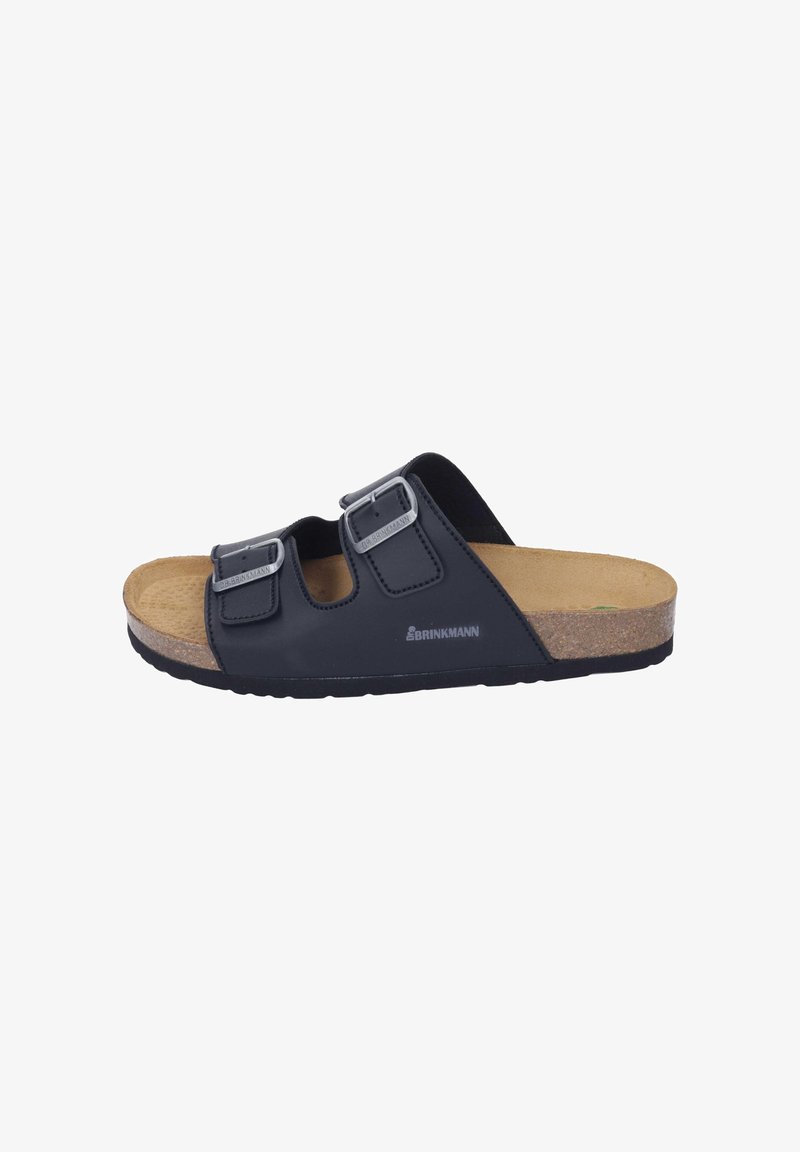 Black slip-on sandal with two adjustable buckled straps, tan cushioned cork footbed, and textured black sole, viewed from the side.