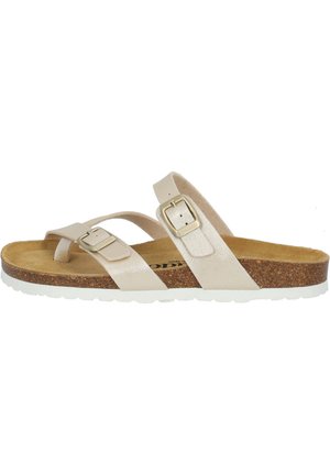 Sandales beige avec deux larges brides, boucles réglables et semelle en liège. Surface texturée avec une semelle blanche et flexible.