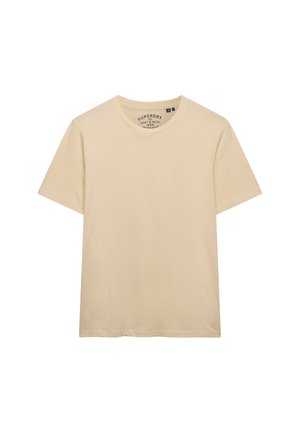 Beżowy t-shirt z krótkim rękawem i okrągłym dekoltem, z małą nadrukowaną metką marki wewnątrz kołnierza, gładki przód i regularny krój.