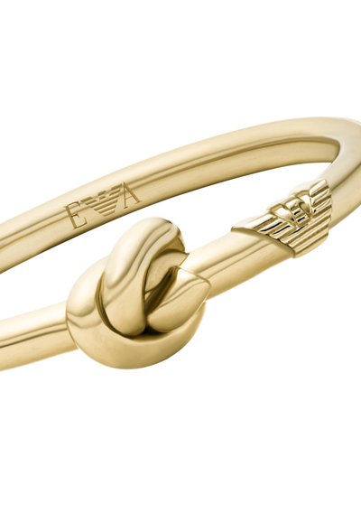 Goldarmband mit Knoten-Design und dem eingravierten Emporio Armani Logo auf dem Band.