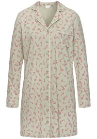 Lys grønn pysjamasbluse med lange ermer, knappestolpe foran og lomme. Mønster med røde polkagriskjepper over hele. Mykt stoff, avslappet passform.