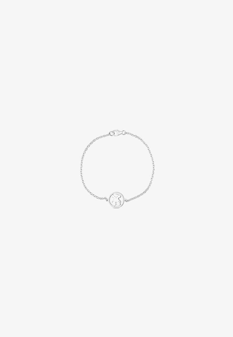 Pulsera de cadena de plata con un colgante circular que presenta un diseño cortado. Enlaces delicados y cierre de langosta. Textura suave.