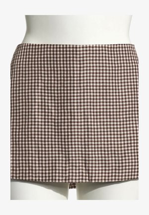 Mini-jupe à carreaux marron et blanc sur un mannequin blanc, coupe droite sans détails visibles ni ornements.