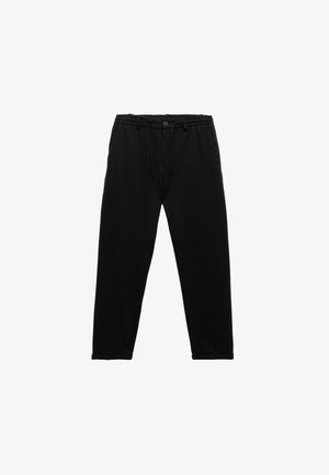 Schwarze Sweatpants aus weichem Stoff, mit einem elastischen Bund und Kordelzug, tapered Beinen und gesteppten Saumdetails.