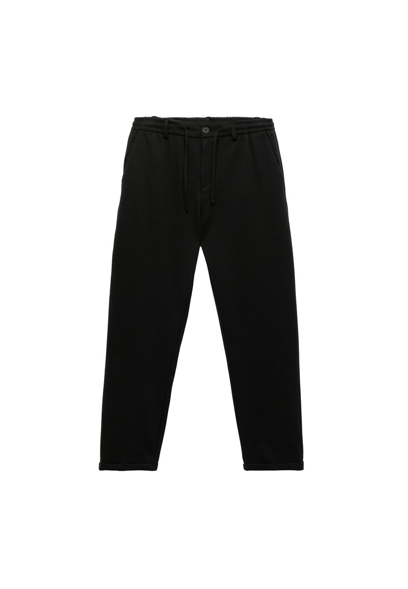Schwarze Sweatpants aus weichem Stoff, mit einem elastischen Bund und Kordelzug, tapered Beinen und gesteppten Saumdetails.