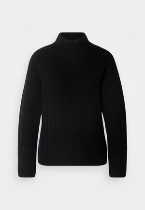 Juodas polo megztinis, pagamintas iš raukšlėtos medžiagos. Turi ilgus rankovės ir priglundantį dizainą su aukštesniu apykakle. Minkšta tekstūra.