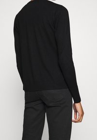 More & More Chaqueta de punto - black